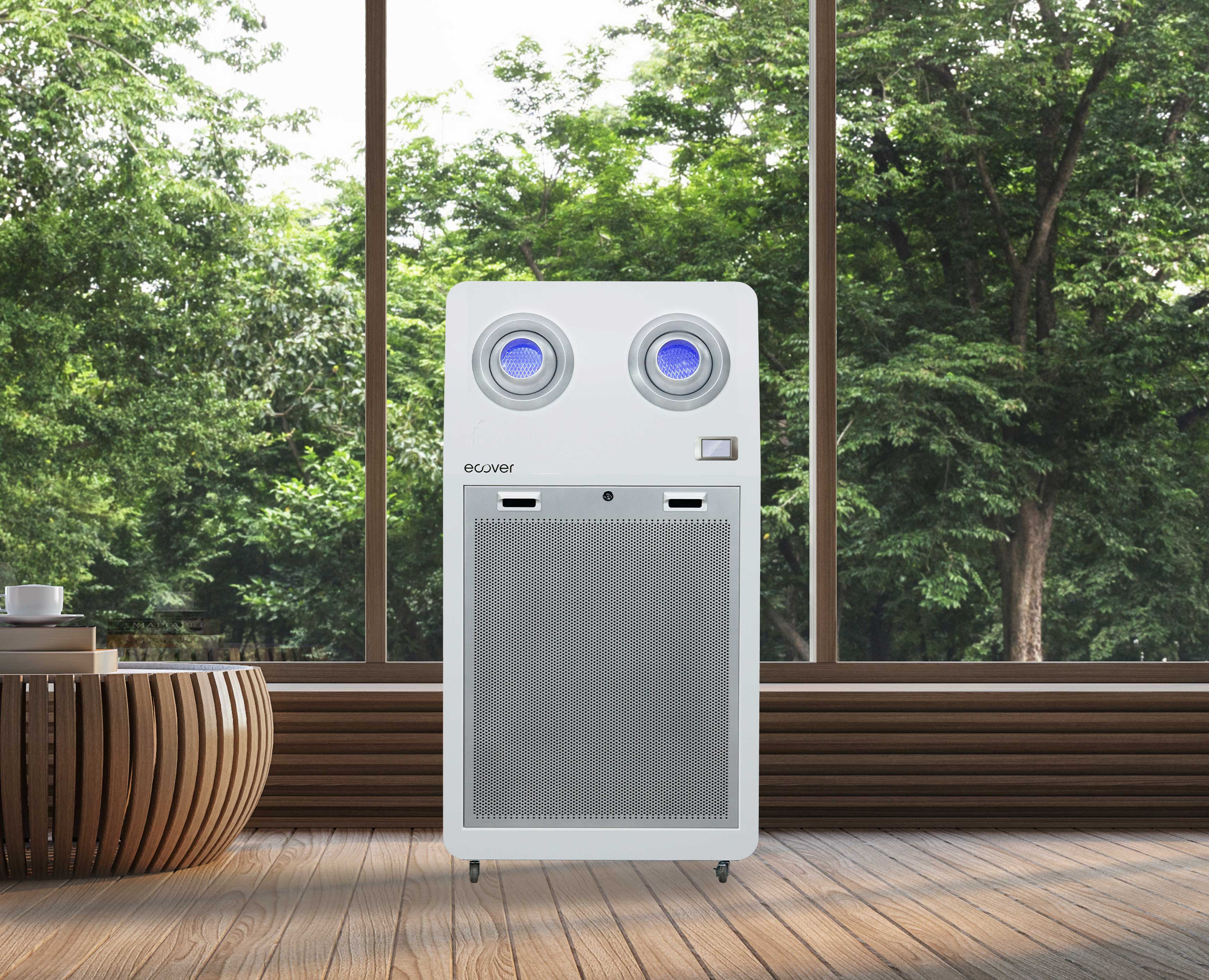 This image features ECOVER Large Capacity Air Purifier Q Series with a background showing a landscape with trees, highlighting the eco-friendly and environmentally connected aspect of the product.